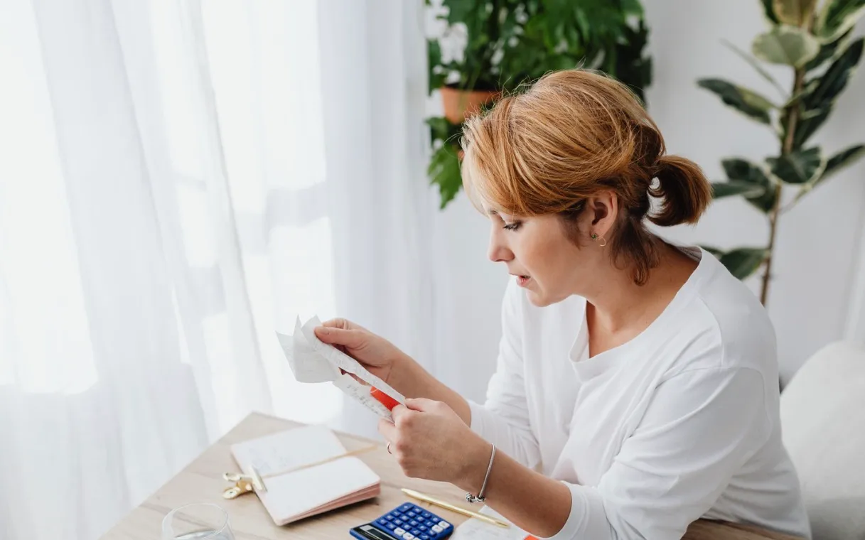 Woman processing bills